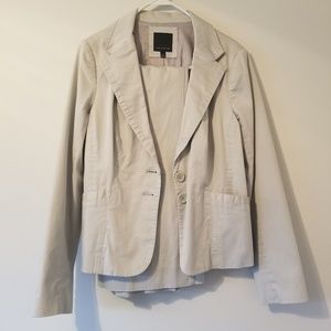 Cream colored business suit